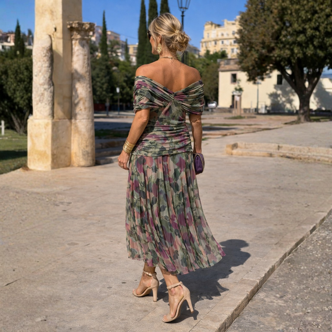 Dlouhé dámské šaty s překříženým výstřihem a elegantní siluetou