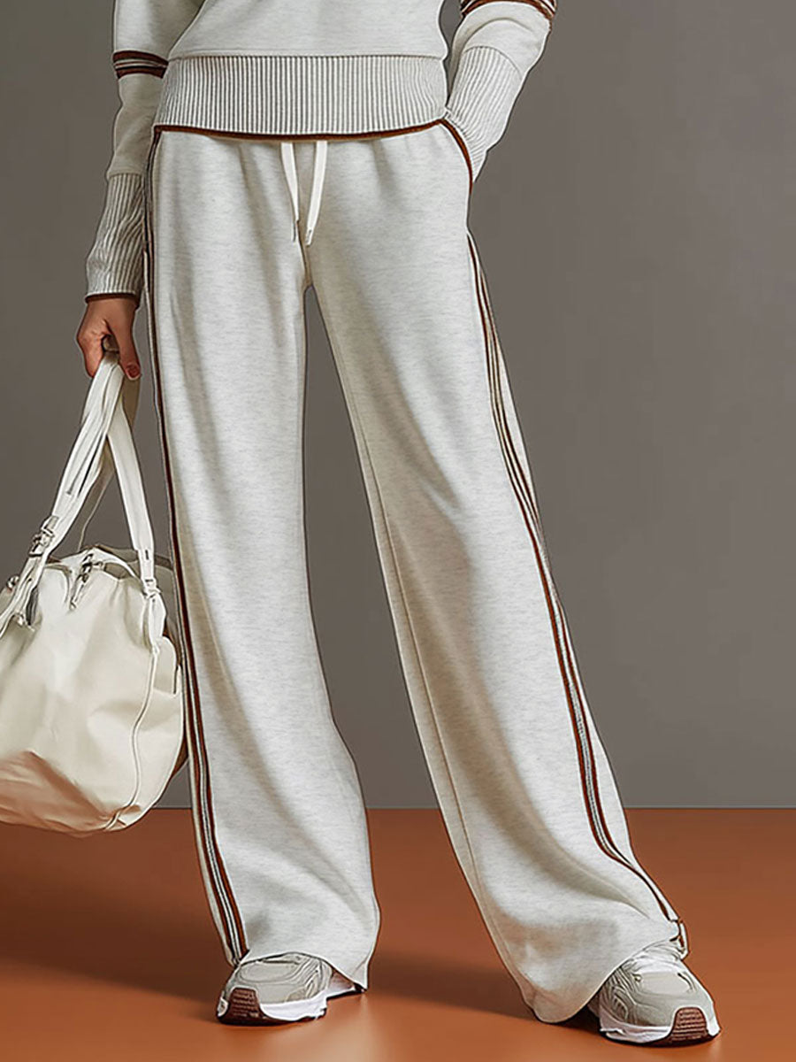 Completo sportivo donna con felpa con zip e pantaloni larghi