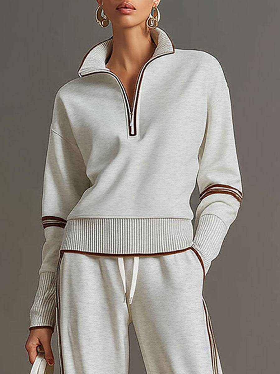 Completo sportivo donna con felpa con zip e pantaloni larghi