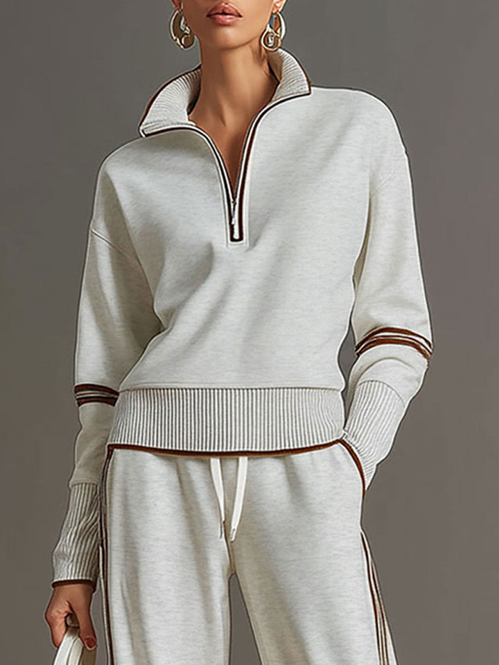 Completo sportivo donna con felpa con zip e pantaloni larghi