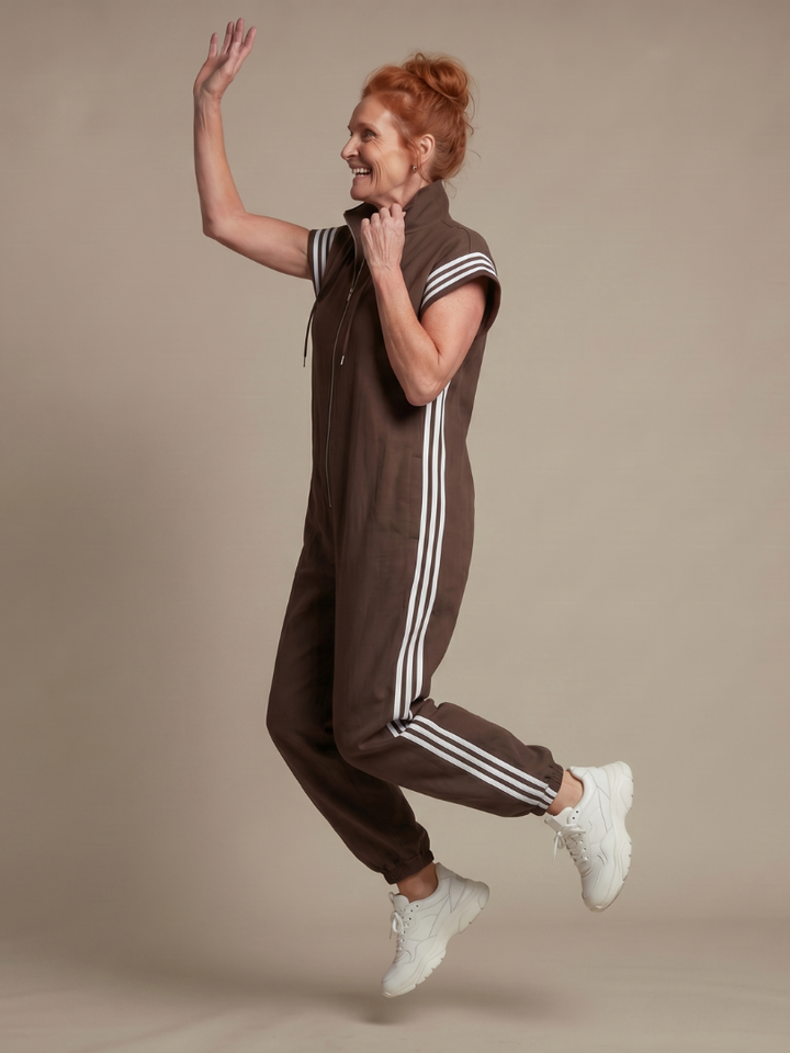Mono para mujer de corte con cremallera y rayas deportivas