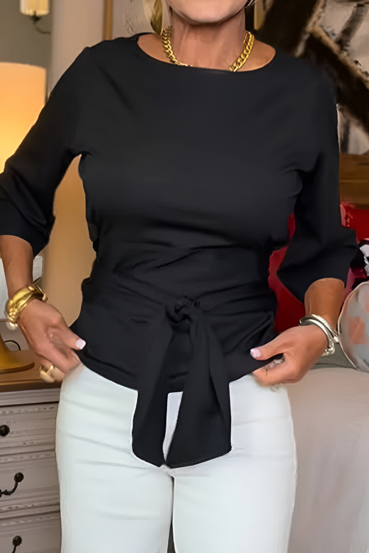 Blusa de mujer con peplum, mangas largas y lazo en la cintura