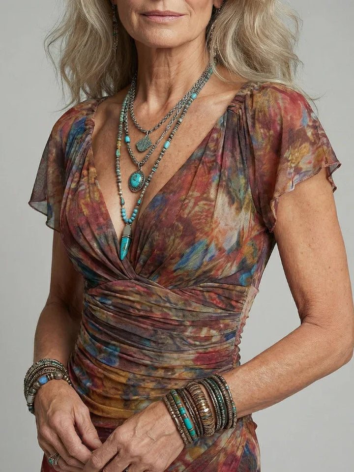 Vestito corto da donna con scollo a incrocio e stampa bohémien