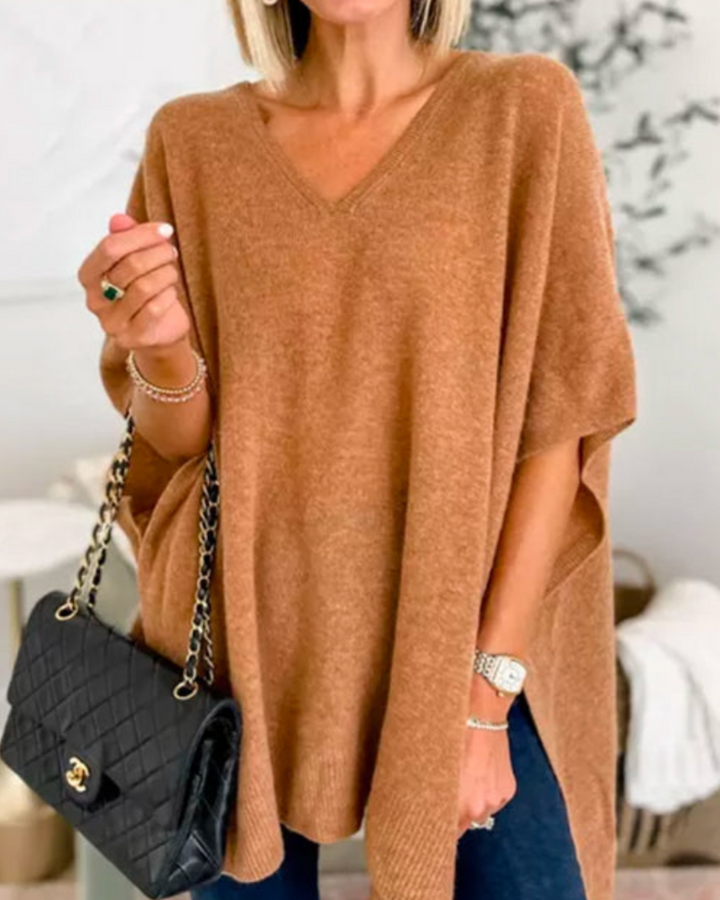 Maglione da donna ampio con scollo a V e taglio fluido