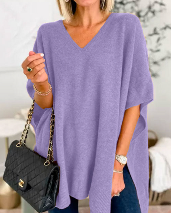 Maglione da donna ampio con scollo a V e taglio fluido