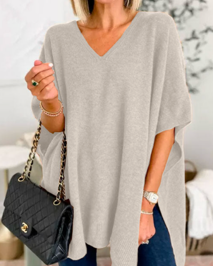 Maglione da donna ampio con scollo a V e taglio fluido