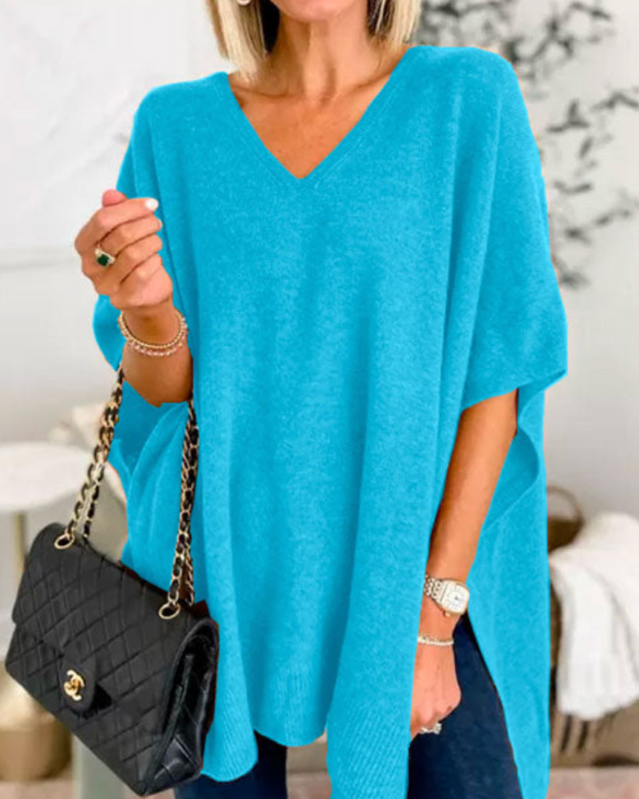 Maglione da donna ampio con scollo a V e taglio fluido
