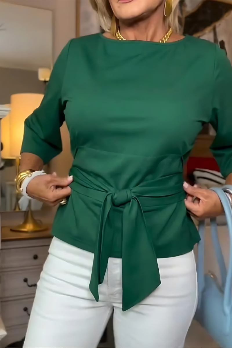 Blusa de mujer con peplum, mangas largas y lazo en la cintura