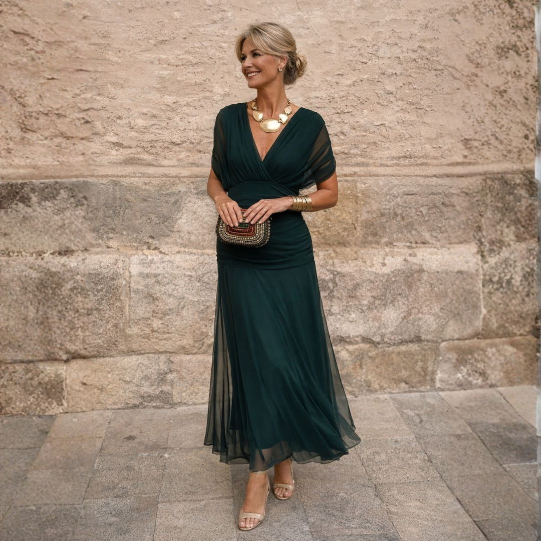 Dlouhé dámské šaty s překříženým výstřihem a elegantní siluetou