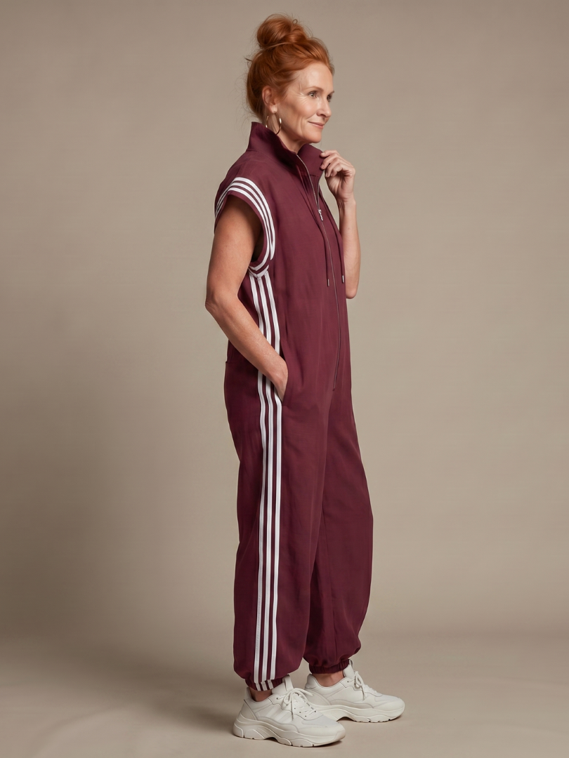 Mono para mujer de corte con cremallera y rayas deportivas