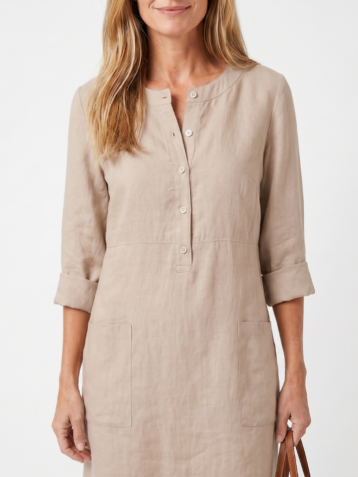Vestito da donna con bottoni e maniche a tre quarti