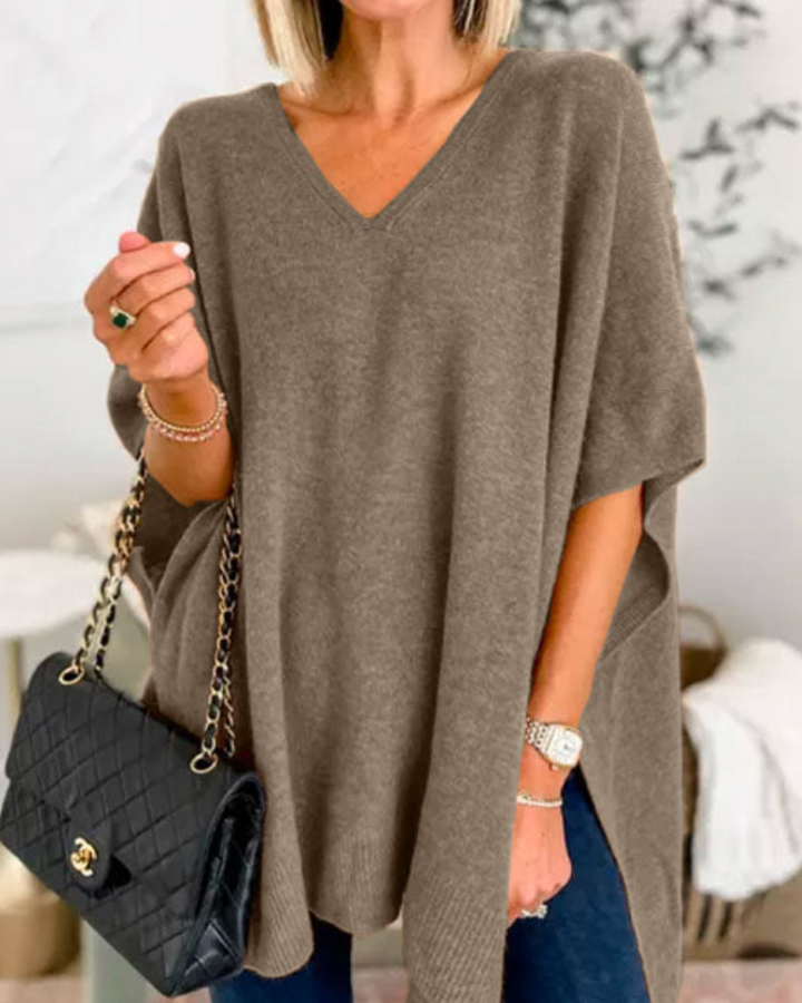 Maglione da donna ampio con scollo a V e taglio fluido
