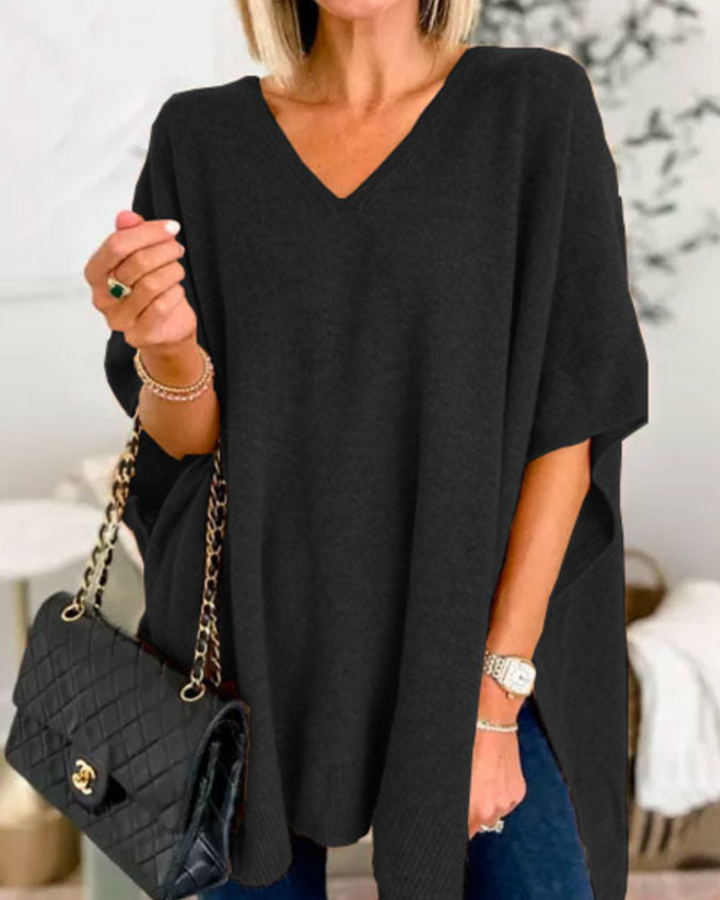 Maglione da donna ampio con scollo a V e taglio fluido