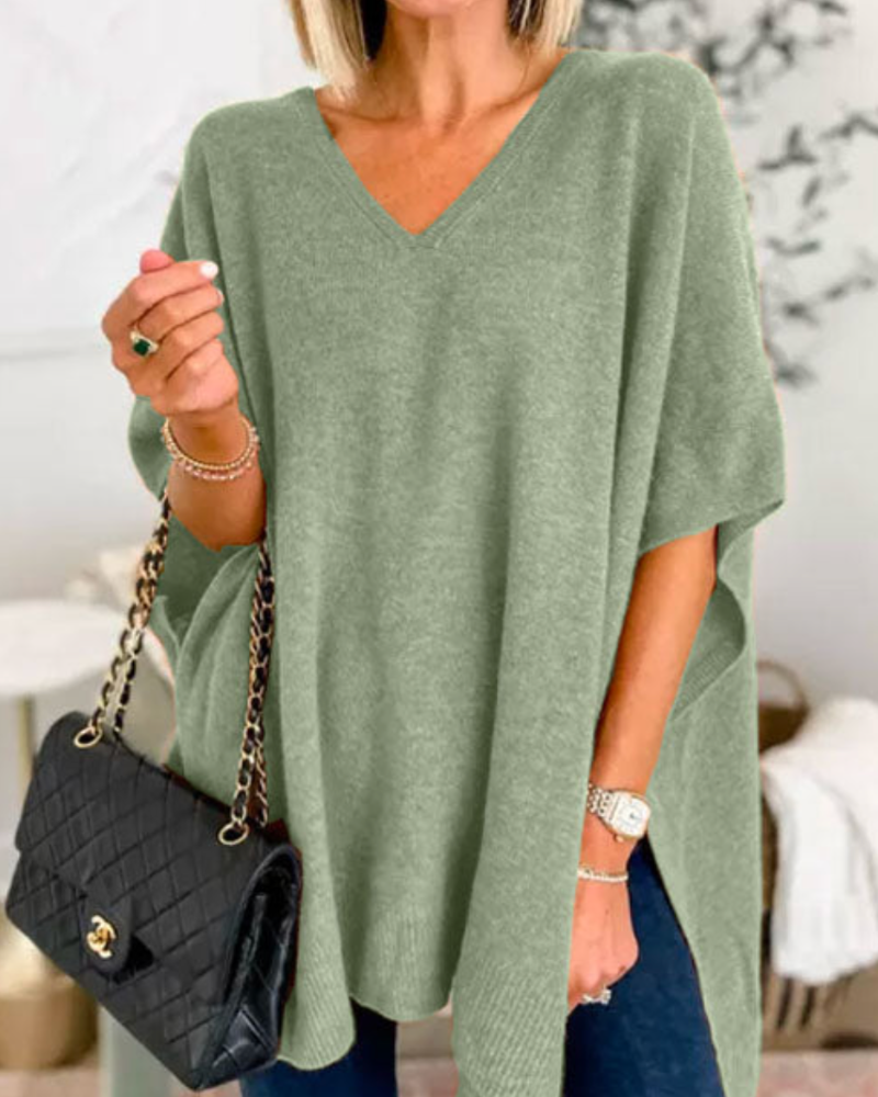 Maglione da donna ampio con scollo a V e taglio fluido