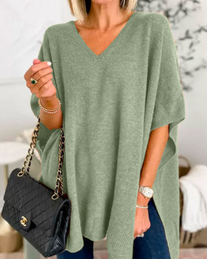 Maglione da donna ampio con scollo a V e taglio fluido