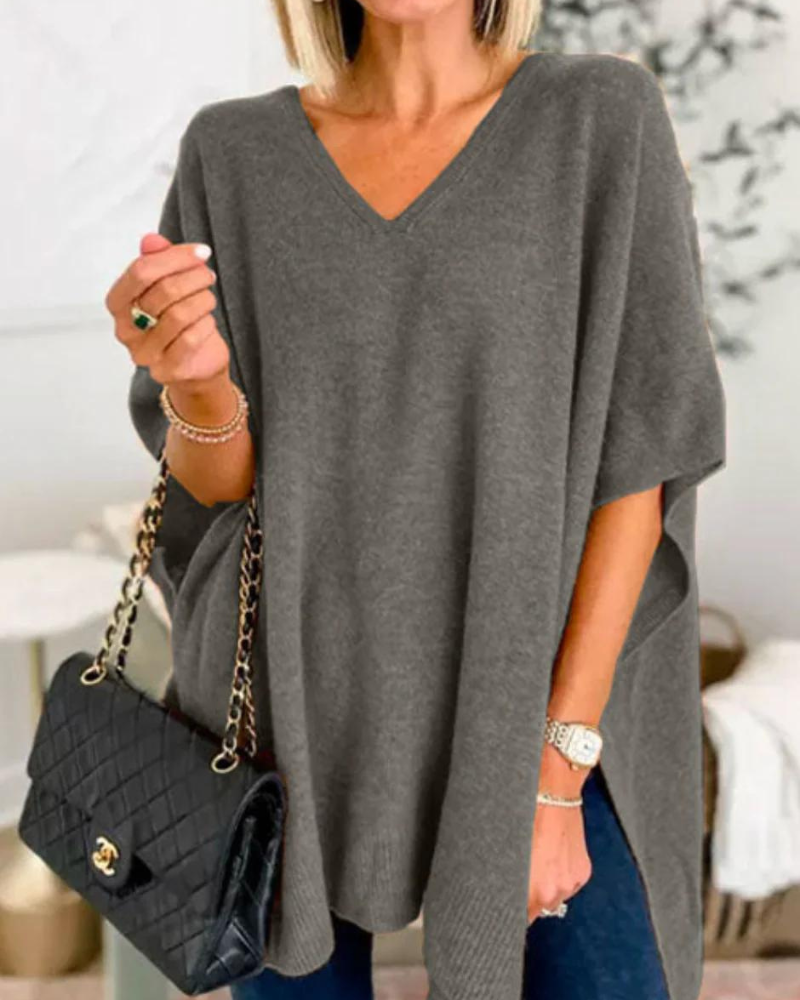 Maglione da donna ampio con scollo a V e taglio fluido