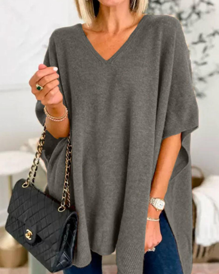 Maglione da donna ampio con scollo a V e taglio fluido