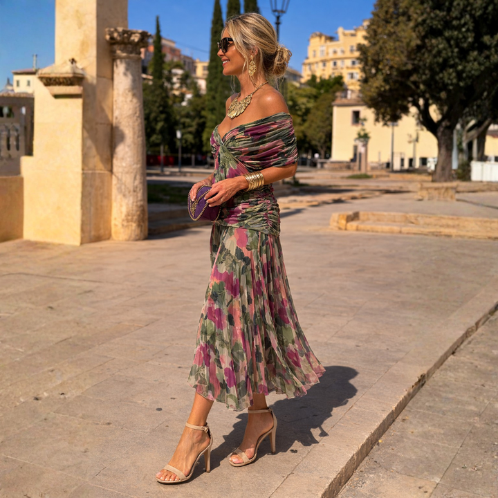 Dlouhé dámské šaty s překříženým výstřihem a elegantní siluetou