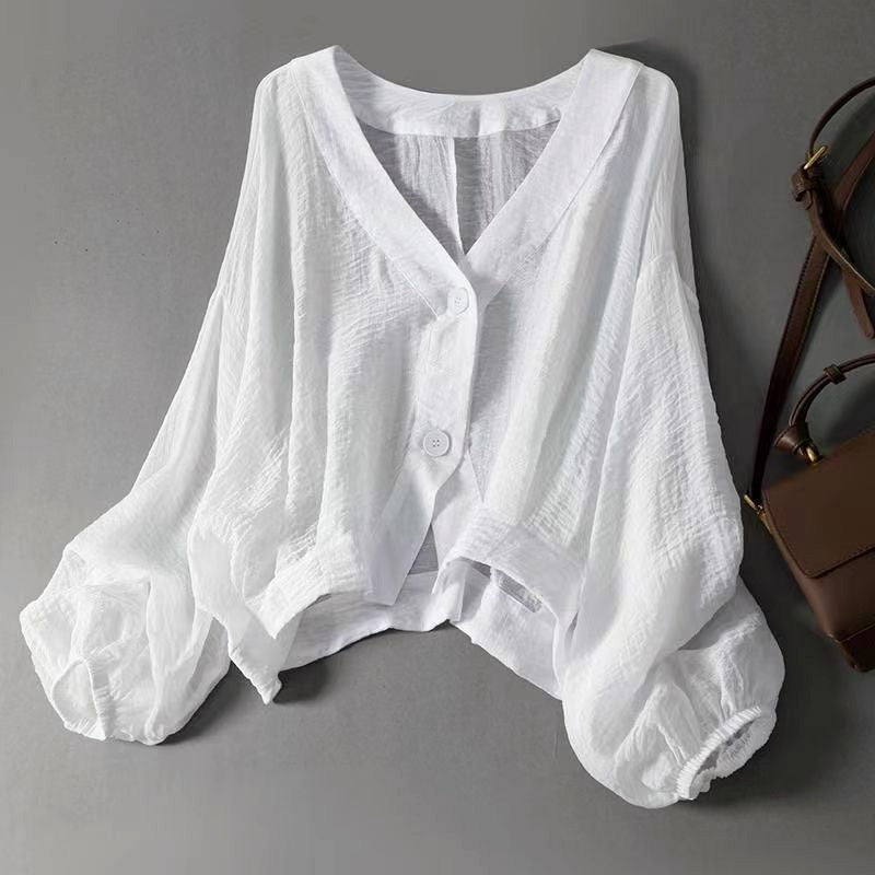 Blusa corta donna con maniche a sbuffo