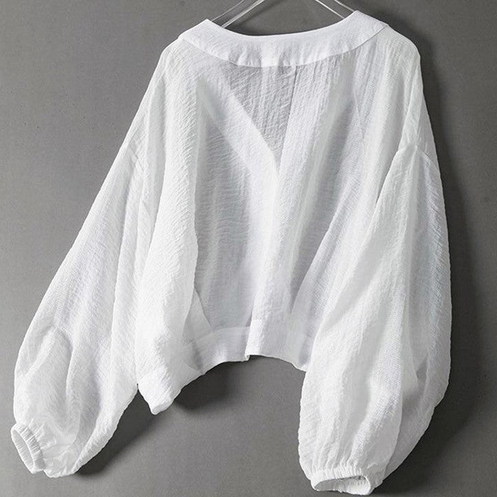 Blusa corta donna con maniche a sbuffo