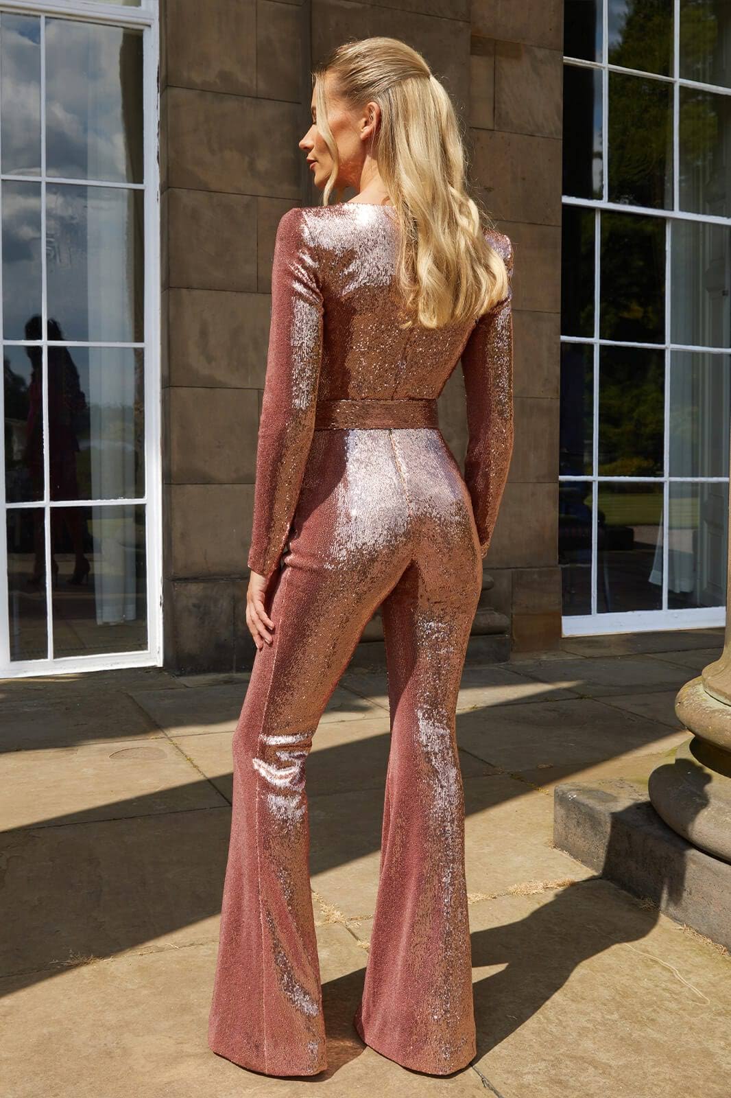 Dámský třpytivý overal s rozšířenými nohavicemi, glam styl