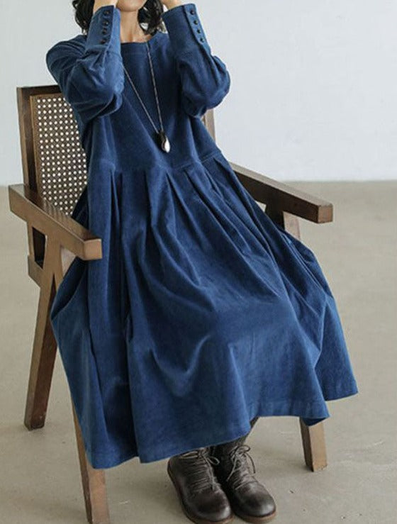 Women's long-sleeved midi dress with a flared cut