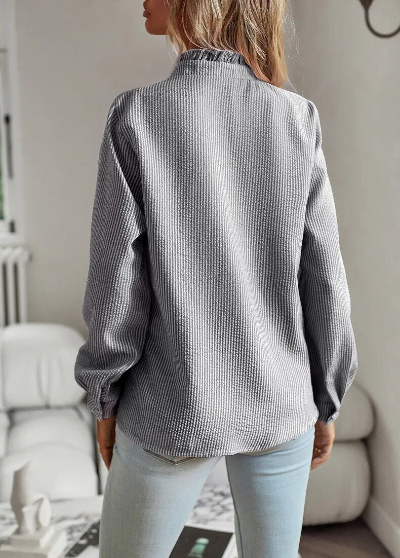 Dámská halenka s dlouhými rukávy, volánovým límcem a knoflíky, elegantní