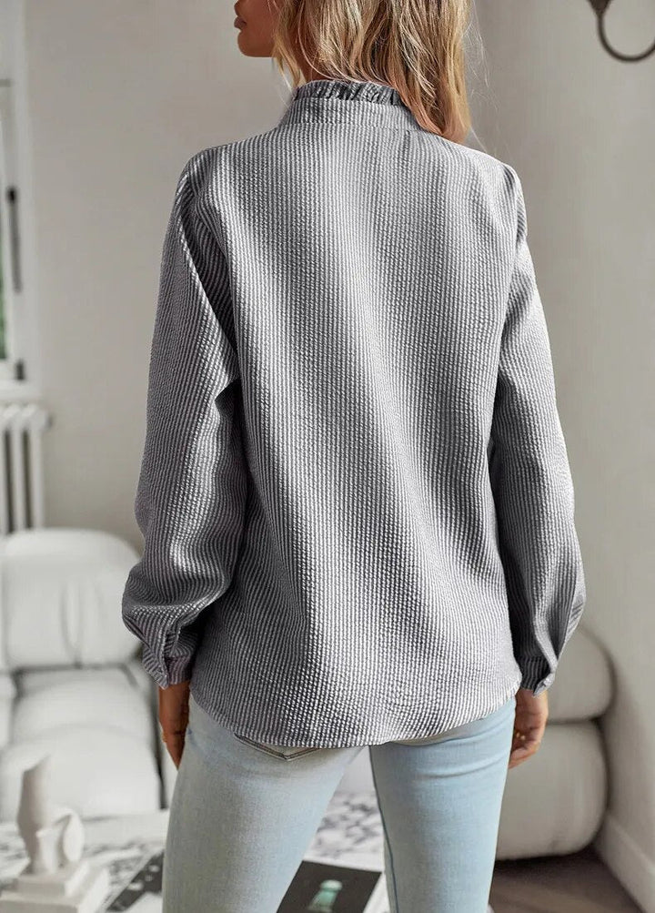 Dámská halenka s dlouhými rukávy, volánovým límcem a knoflíky, elegantní
