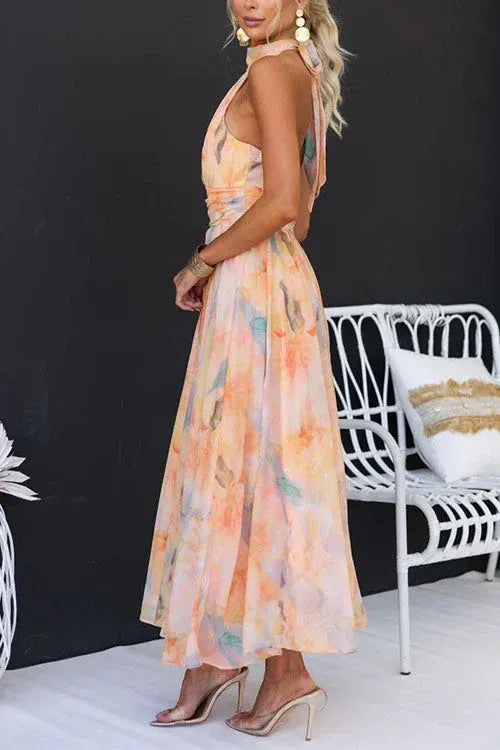 Elegantní plisované midi šaty s halter výstřihem
