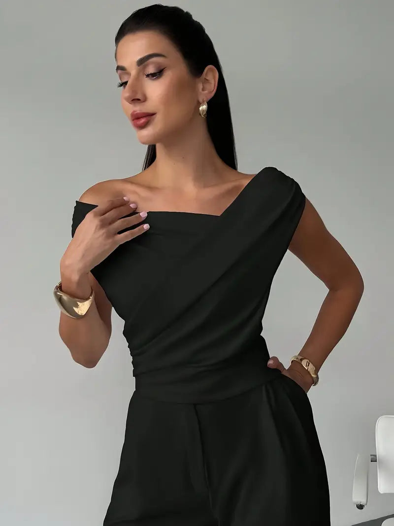 Elegantní top s volánem na rameni