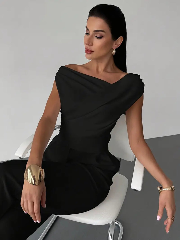 Elegantní top s volánem na rameni