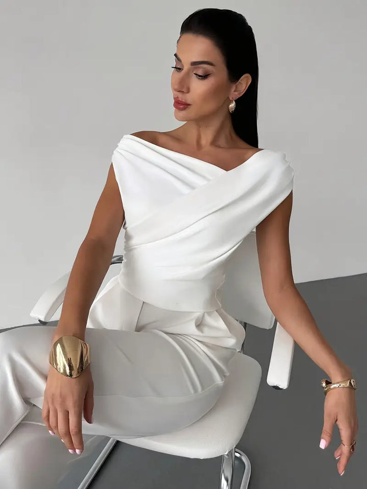 Elegantní top s volánem na rameni