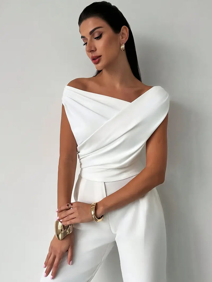 Elegantní top s volánem na rameni