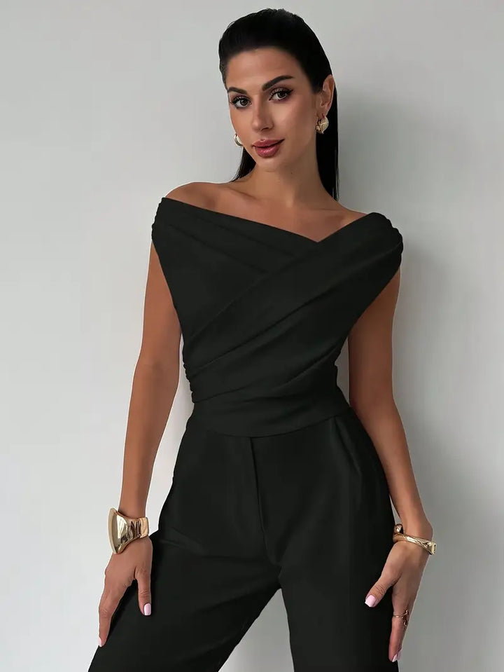 Elegantní top s volánem na rameni