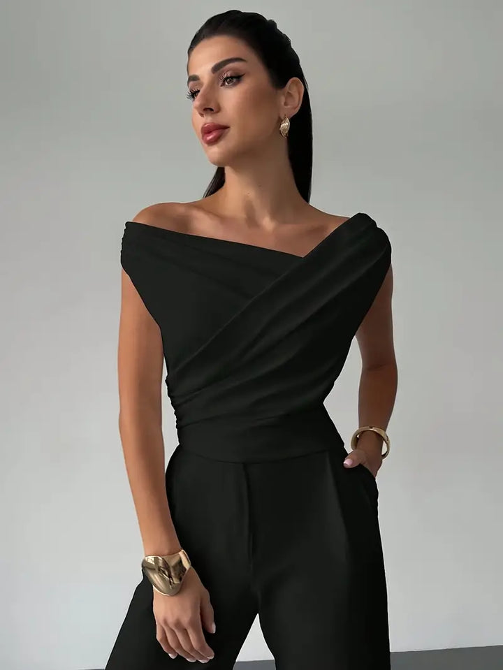 Elegantní top s volánem na rameni