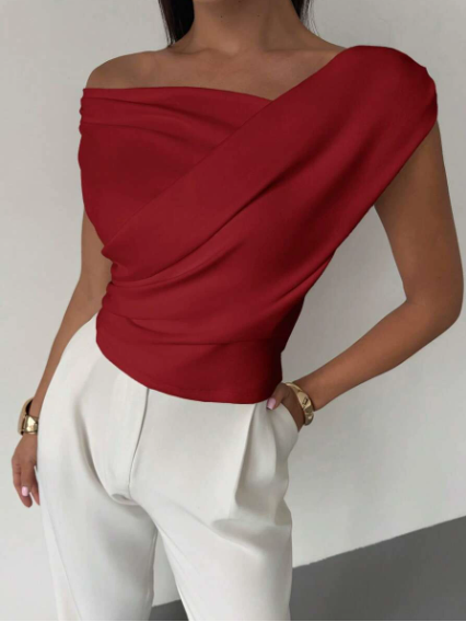 Elegantní top s volánem na rameni