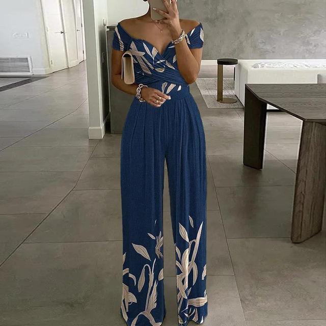 Dámský overal s odhalenými rameny a elegantním potiskem