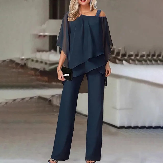 Conjunto de mujer con top de hombros descubiertos y pantalón ancho