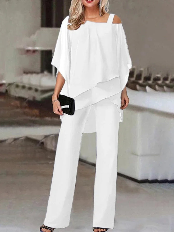 Conjunto de mujer con top de hombros descubiertos y pantalón ancho