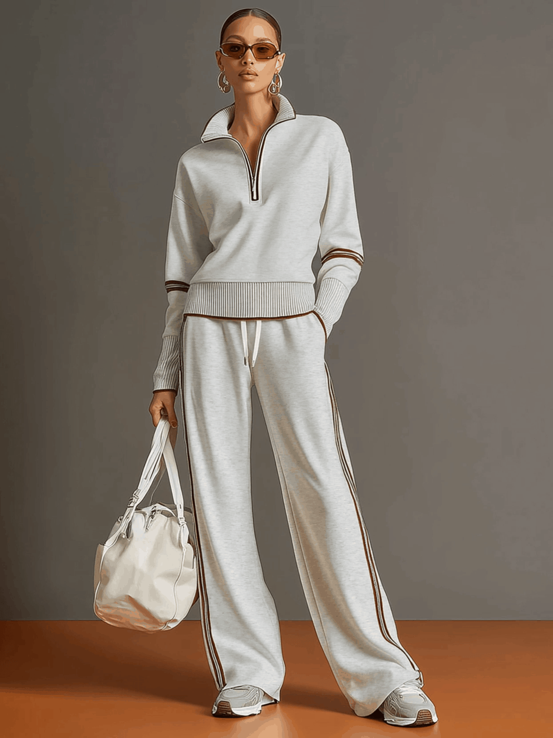Completo sportivo donna con felpa con zip e pantaloni larghi