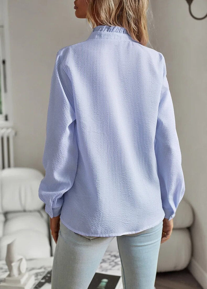 Dámská halenka s dlouhými rukávy, volánovým límcem a knoflíky, elegantní