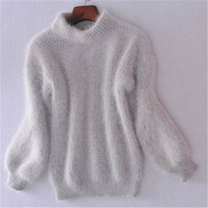 Jersey de mujer de cuello alto y mangas abullonadas