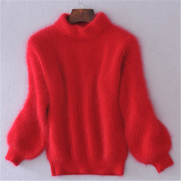 Jersey de mujer de cuello alto y mangas abullonadas