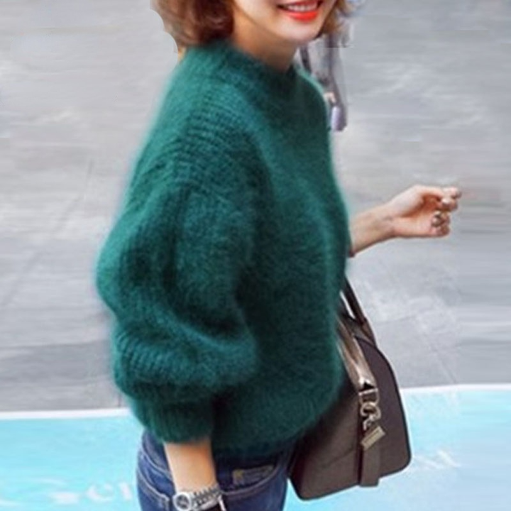Jersey de mujer de cuello alto y mangas abullonadas