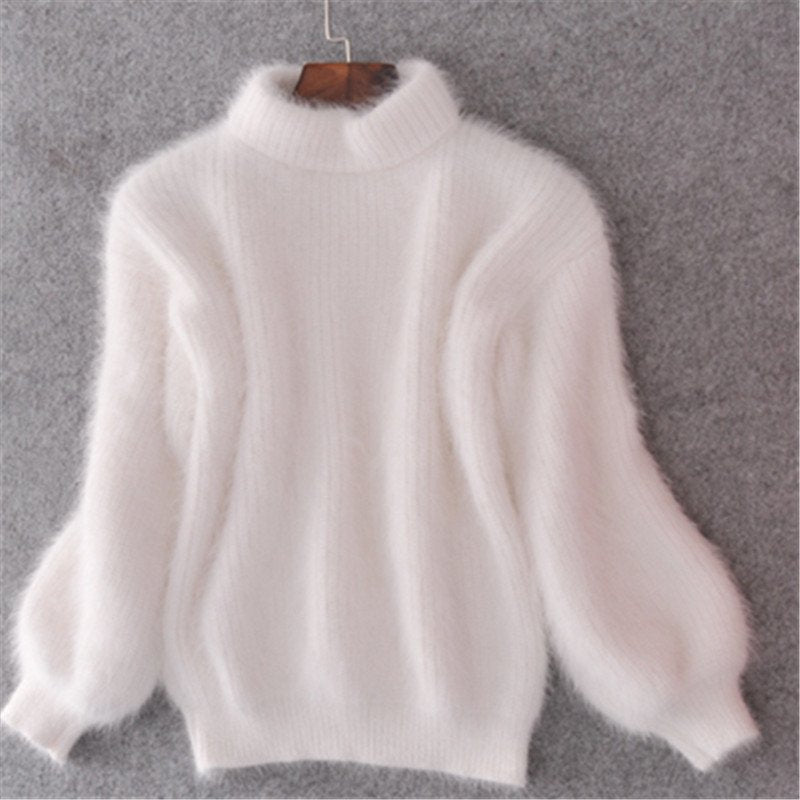 Jersey de mujer de cuello alto y mangas abullonadas
