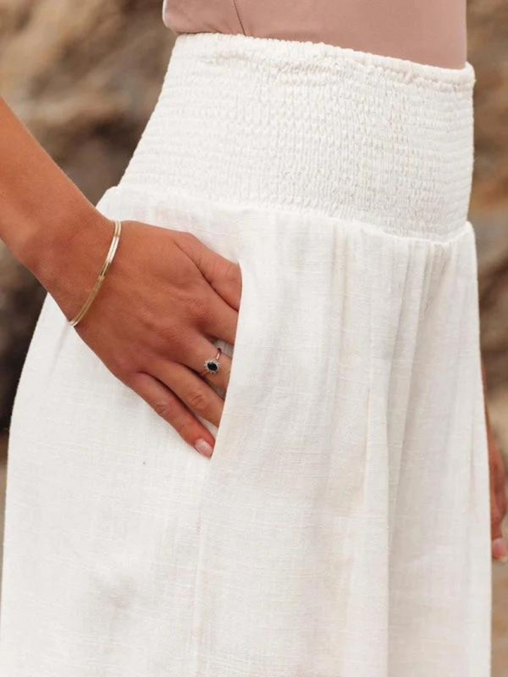 Pantaloni donna a vita alta fluidi con gambe larghe