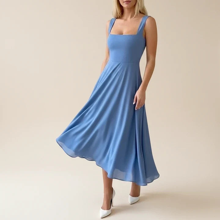 Elegantní midi šaty bez rukávů v bílé a černé barvě pro ženy