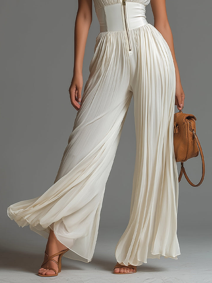 Tuta da donna bianca con scollo a V e gambe larghe