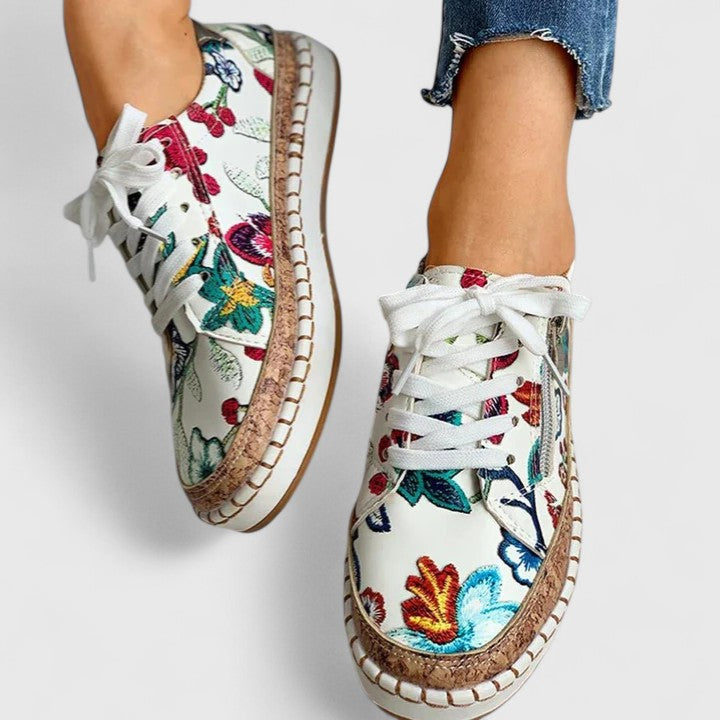 Sneakers da donna con stampa floreale e suola platform