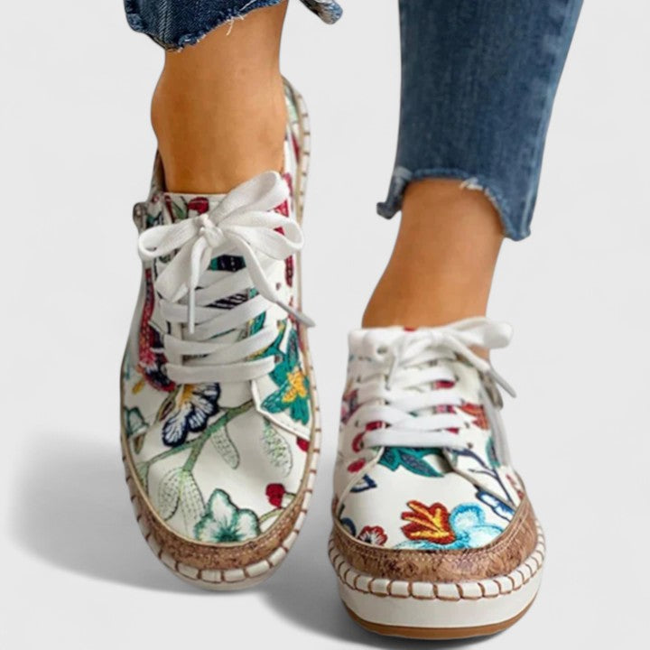 Sneakers da donna con stampa floreale e suola platform